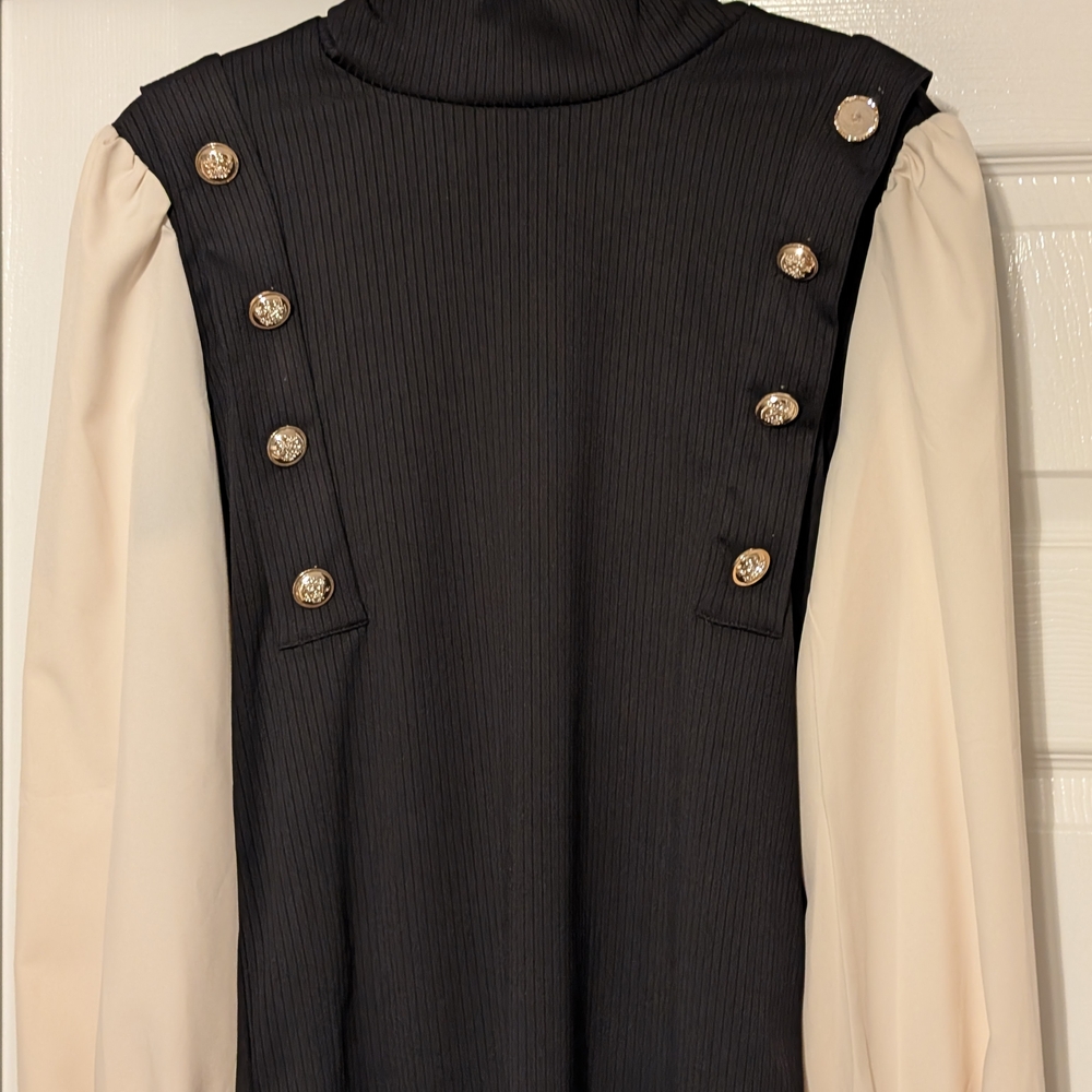 Chic Black and Cream Button-Accent Blouse